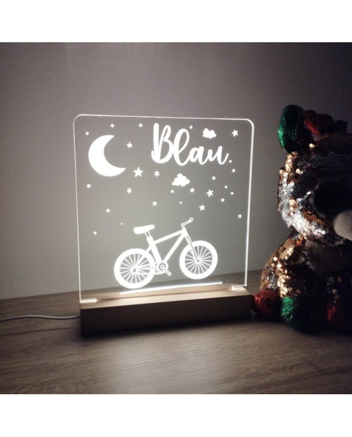 Lámpara infantil en metacrilato transparente con base de madera - modelo bici