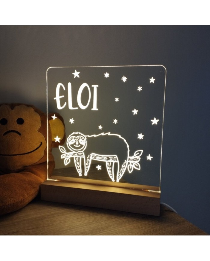 Lámpara infantil en metacrilato transparente con base de madera - modelo perezoso